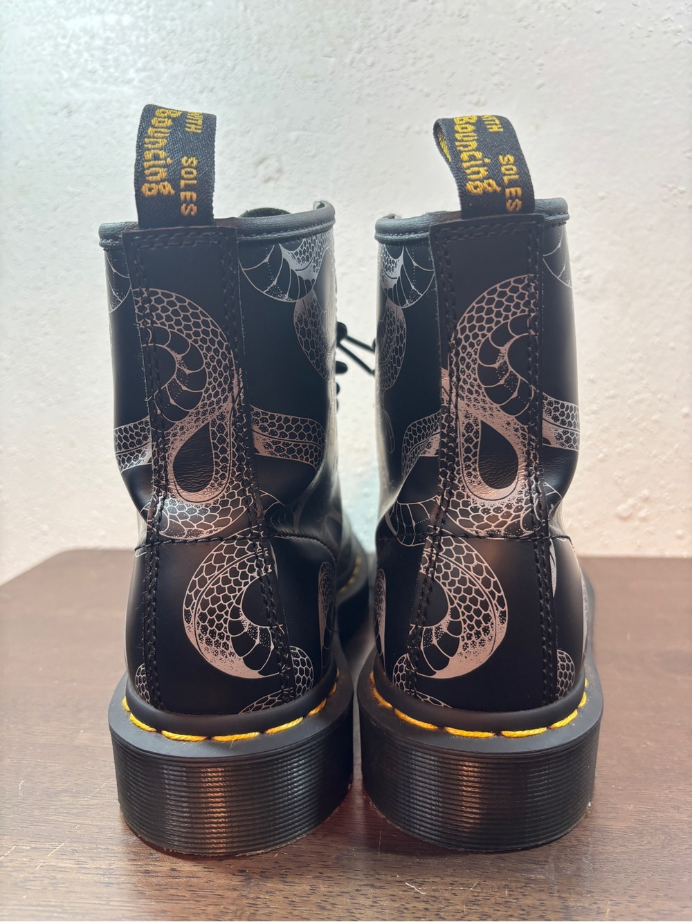 Dr. Martens Black Lace-Up Boots with White Snake Print and Yellow Stitching - Picture 5 of 8